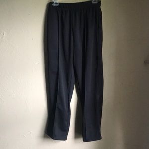 Pleated black stretch slacks